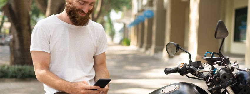 motorcyclist enjoying mobile experience 